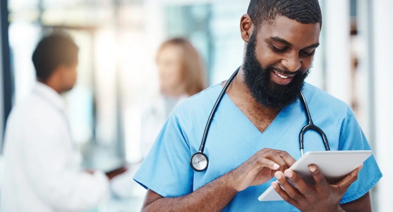 registered nurse picking up nearby RN jobs on tablet